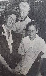 Fernhill Matron Gwenda Shaw w Caboolture State School students 1994_web.jpg